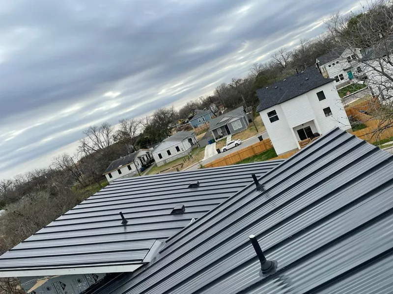 Standing seam metal roof panels with vents for Skylight Repair in Sterling